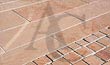 All side sawn and flamed tiles with cobbles with top sawn and flamed